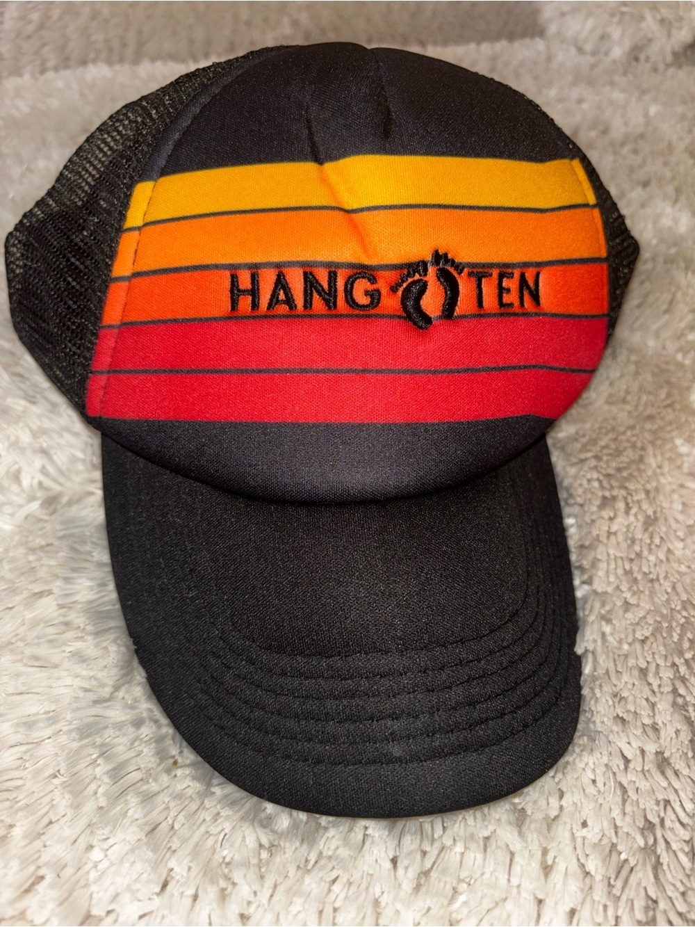Hang Ten Black Trucker Hat with Yellow, Orange and Red Stripes